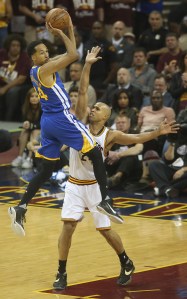 The Golden State Warriors' Shaun Livingston, left, looks to pass while being defended by the Cleveland Cavaliers' Richard Jefferson in the second quarter during Game 3 of the NBA Finals on Wednesday, June 8, 2016, at Quicken Loans Arena in Cleveland. (Phil Masturzo/Akron Beacon Journal/TNS)